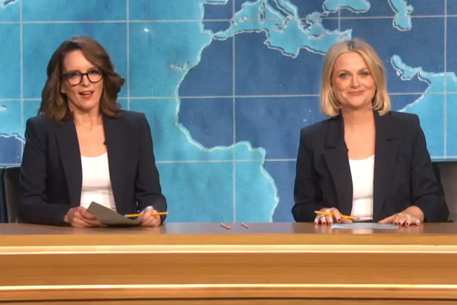 SNL stars Tina Fey and Amy Poehler co-anchor Emmys Weekend Update Illustrations