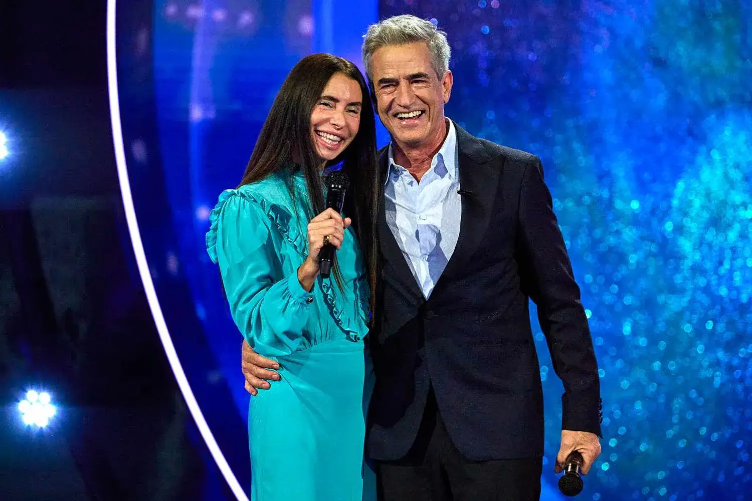 Dermot Mulroney and wife Prima talk singing on We Are Family, Dylan McDermott, and making classic rom-coms Illustrations